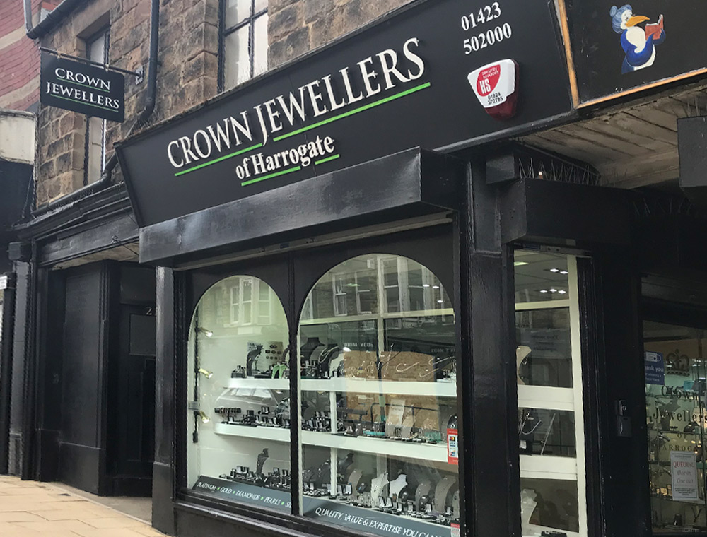 Inside Crown Jewellers of Harrogate at 23 Commercial Street, the mahogany cases and velvet trays of the shop floor